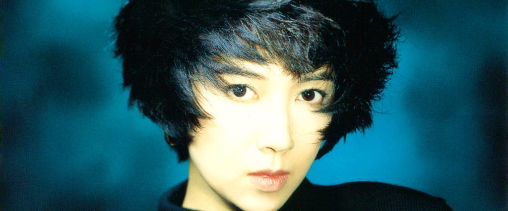 Tomoko Aran 1980s synthpop-style portrait.